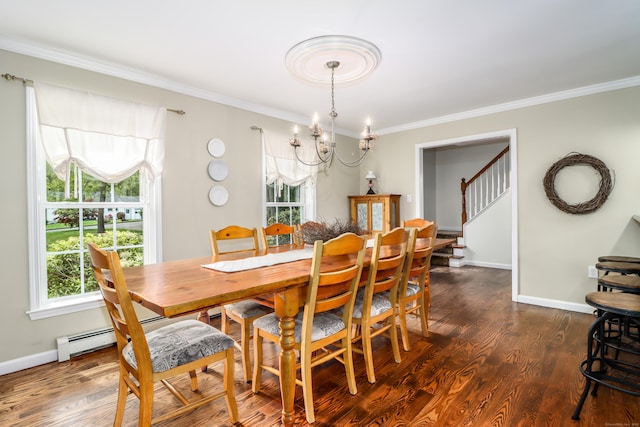dining room featuring a chandelier, ornamental molding, plenty of natural light, baseboards, and dark wood-type flooring