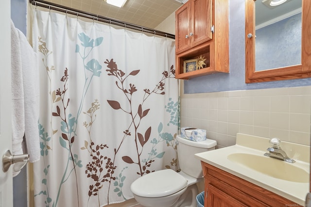 full bath featuring tile walls, toilet, vanity, and a shower with curtain