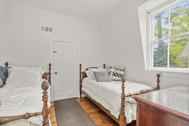 bedroom with light wood-style flooring