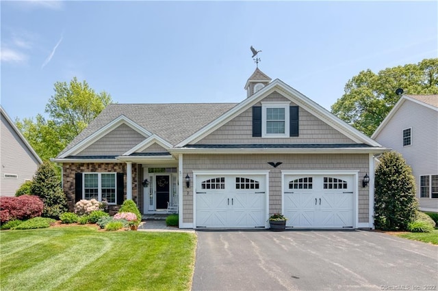 2 Crestview Dr Unit 2, Middlefield, CT 06481 - view of front of house with asphalt driveway, an attached garage, a front lawn, and a shingled roof