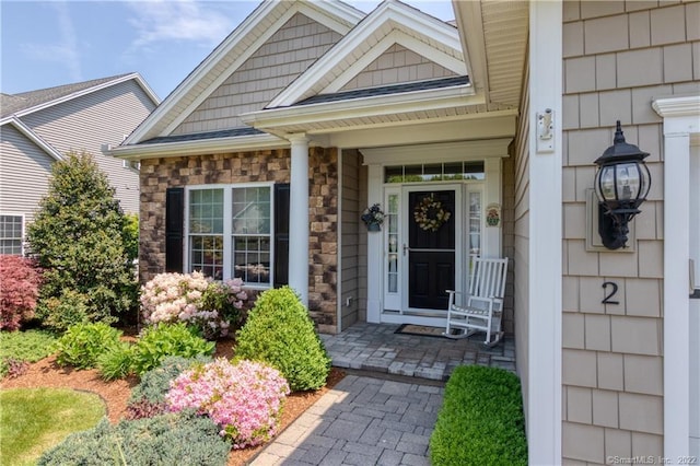 2 Crestview Dr Unit 2, Middlefield, CT 06481 - view of exterior entry featuring a porch and stone siding