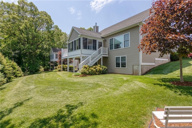 2 Crestview Dr Unit 2, Middlefield, CT 06481 - rear view of property with a sunroom, stairway, a lawn, and a chimney