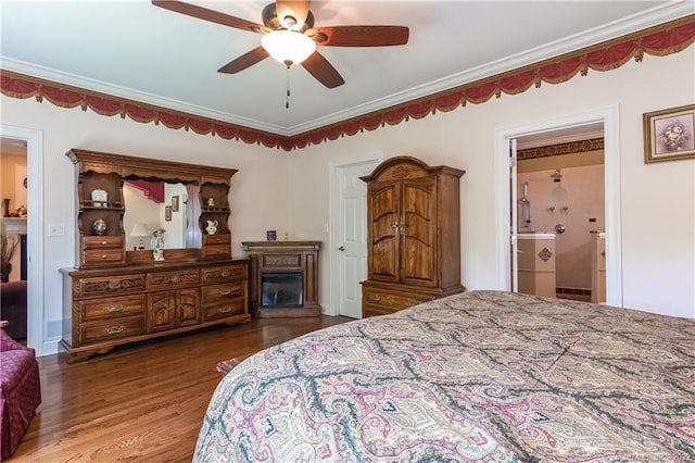2 Crestview Dr Unit 2, Middlefield, CT 06481 - bedroom featuring wood finished floors, crown molding, ceiling fan, connected bathroom, and a glass covered fireplace