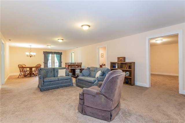 2 Crestview Dr Unit 2, Middlefield, CT 06481 - living room featuring carpet flooring, a chandelier, and baseboards