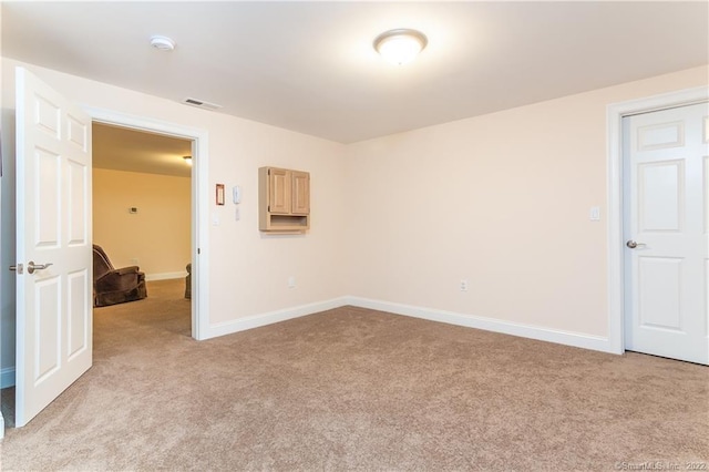 2 Crestview Dr Unit 2, Middlefield, CT 06481 - spare room featuring light carpet, a smoke detector, and baseboards