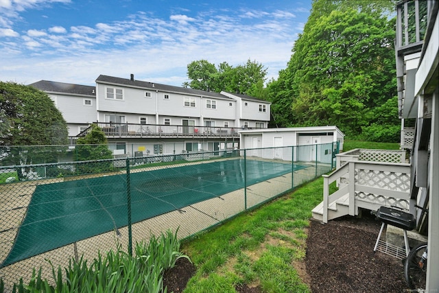 29 Van Buren Ave Apt L6, Norwalk, CT 06850 - view of pool featuring fence, a residential view, and an outbuilding