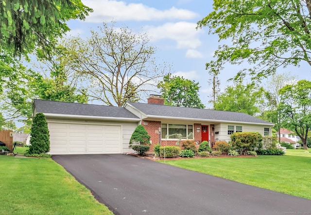 26 Williams Rd, Cheshire, CT 06410 - ranch-style house with a garage, asphalt driveway, a chimney, a front lawn, and brick siding