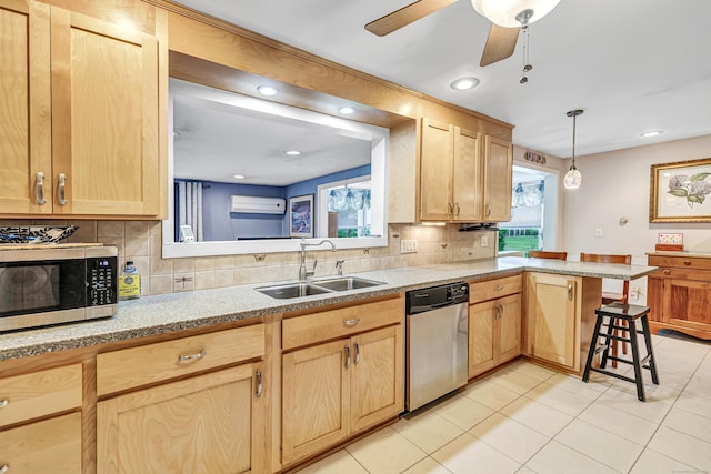 26 Williams Rd, Cheshire, CT 06410 - kitchen with appliances with stainless steel finishes, a sink, an AC wall unit, backsplash, and light brown cabinetry