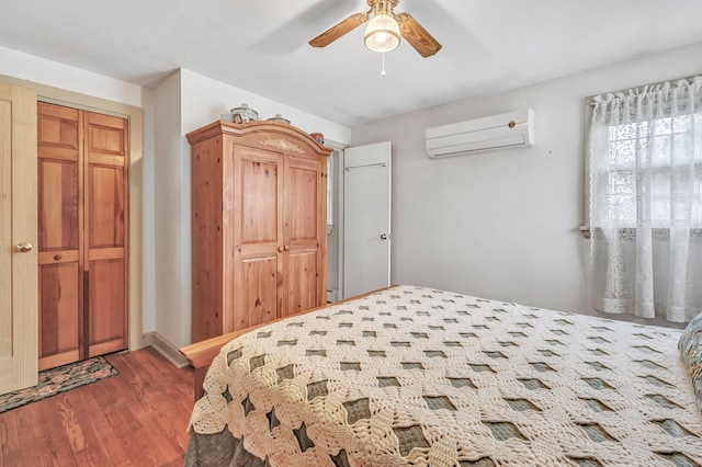 26 Williams Rd, Cheshire, CT 06410 - bedroom with an AC wall unit, wood finished floors, and a ceiling fan