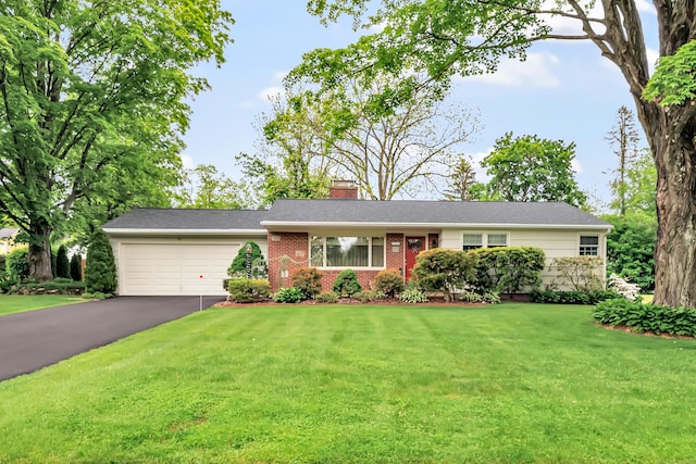26 Williams Rd, Cheshire, CT 06410 - ranch-style house with a chimney, driveway, a garage, brick siding, and a front yard