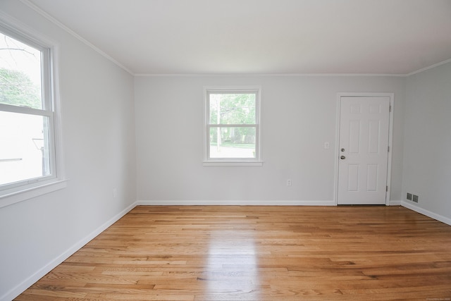 5 Roberge Rd, Bristol, CT 06010 - spare room with light wood-type flooring, ornamental molding, and baseboards