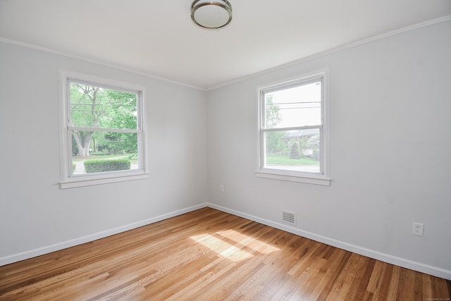5 Roberge Rd, Bristol, CT 06010 - spare room featuring baseboards, ornamental molding, and hardwood / wood-style flooring
