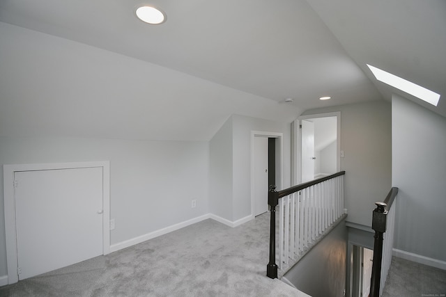 5 Roberge Rd, Bristol, CT 06010 - additional living space featuring a skylight, vaulted ceiling, carpet flooring, and baseboards