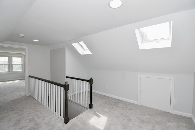 5 Roberge Rd, Bristol, CT 06010 - bonus room with a skylight, vaulted ceiling, carpet, and baseboards
