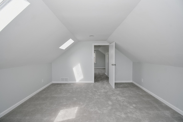 5 Roberge Rd, Bristol, CT 06010 - additional living space featuring a skylight, carpet floors, vaulted ceiling, and baseboards