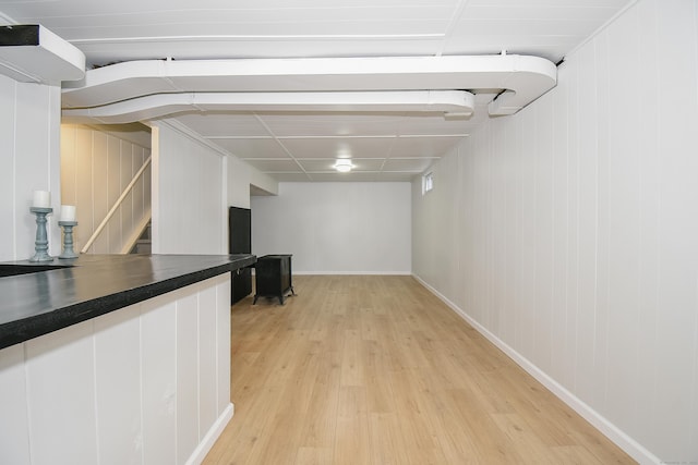 5 Roberge Rd, Bristol, CT 06010 - finished basement with light wood finished floors, stairway, and baseboards