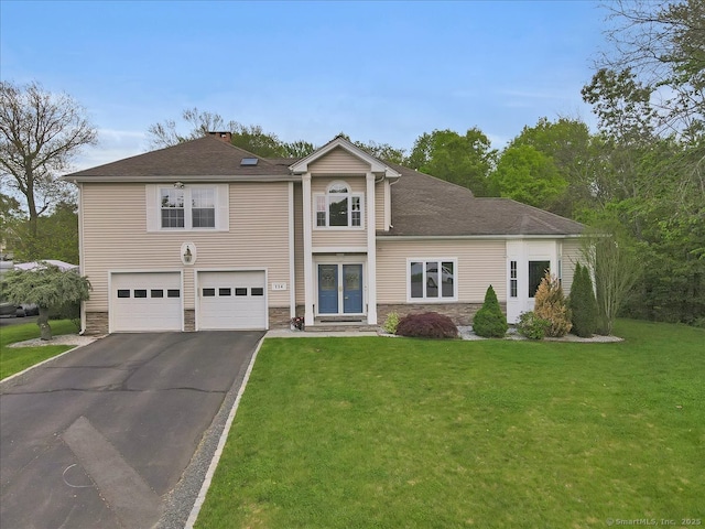 114 Boulder Dr, Rocky Hill, CT 06067 - traditional-style house with asphalt driveway, an attached garage, stone siding, a front lawn, and a chimney