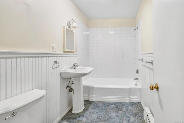 42 N Lake Dr Apt C2, Hamden, CT 06517 - full bath with baseboard heating, shower / tub combination, a wainscoted wall, tile patterned flooring, and toilet
