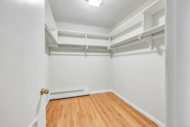 42 N Lake Dr Apt C2, Hamden, CT 06517 - walk in closet featuring a baseboard radiator and wood finished floors