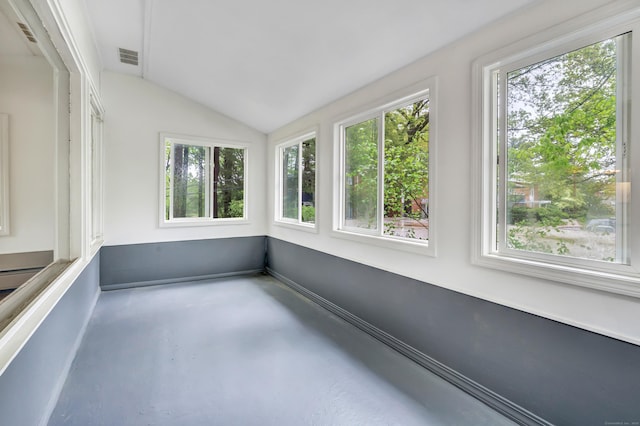 42 N Lake Dr Apt C2, Hamden, CT 06517 - unfurnished sunroom with plenty of natural light, concrete floors, and vaulted ceiling