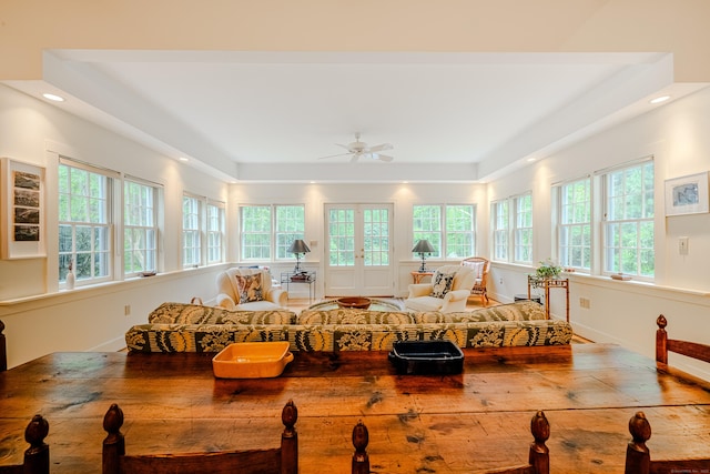 sunroom featuring french doors and healthy amount of natural light