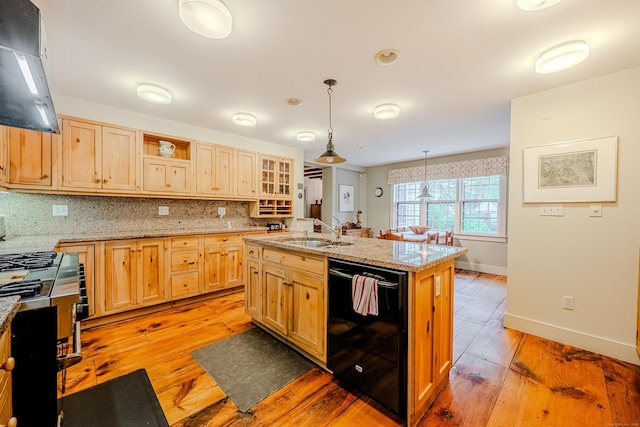 kitchen with dishwasher, a sink, light wood-style flooring, open shelves, and tasteful backsplash