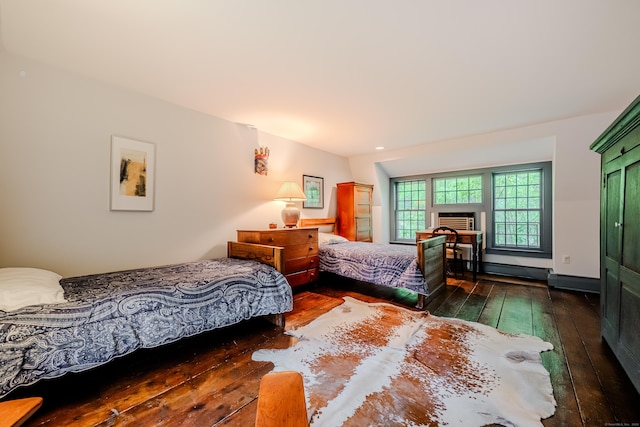 bedroom with wood-type flooring