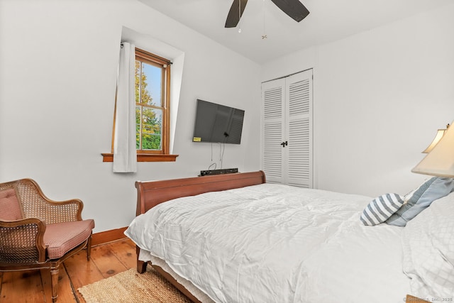 47 Hollow Tree Ridge Rd, Darien, CT 06820 - bedroom featuring hardwood / wood-style floors, a closet, baseboards, and a ceiling fan