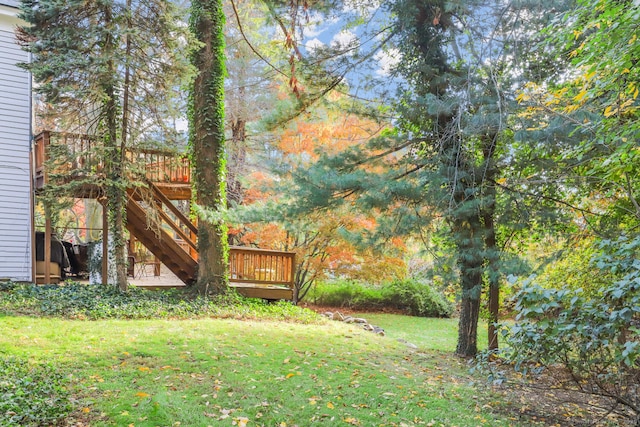 47 Hollow Tree Ridge Rd, Darien, CT 06820 - view of green lawn featuring a deck and stairway