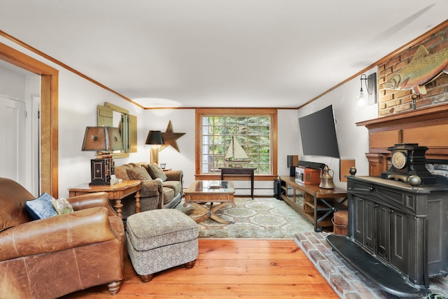 47 Hollow Tree Ridge Rd, Darien, CT 06820 - living area featuring ornamental molding, wood-type flooring, a baseboard radiator, and a wood stove