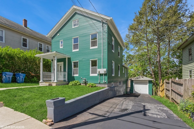 70 Maple St, Meriden, CT 06451 - view of front of house with driveway, an outdoor structure, and a detached garage