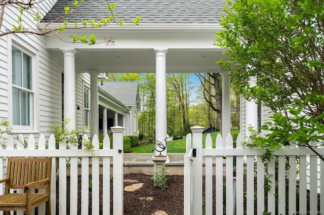 view of patio with fence and covered porch