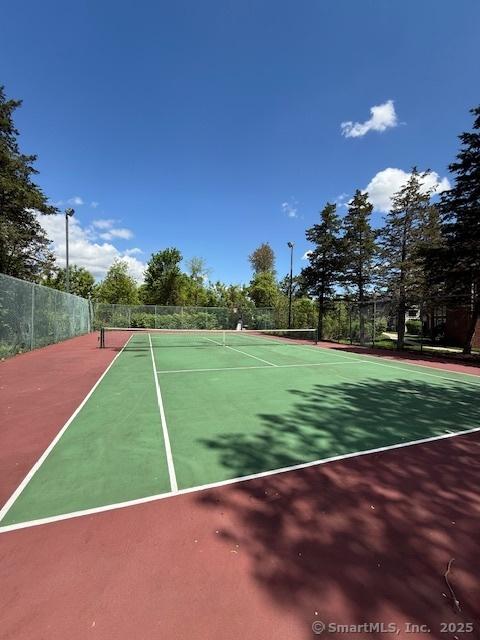 202 Carriage Crossing Ln Unit 202, Middletown, CT 06457 - view of tennis court featuring community basketball court