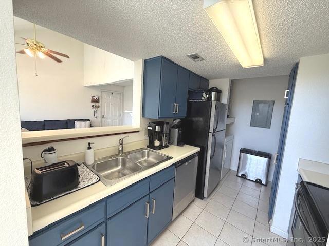 202 Carriage Crossing Ln Unit 202, Middletown, CT 06457 - kitchen featuring blue cabinets, a sink, dishwasher, a ceiling fan, and a textured ceiling