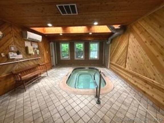 202 Carriage Crossing Ln Unit 202, Middletown, CT 06457 - view of pool with a wall mounted AC and an in-ground hot tub