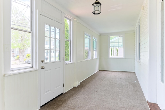 262 Blohm St, West Haven, CT 06516 - unfurnished sunroom with healthy amount of natural light and carpet flooring