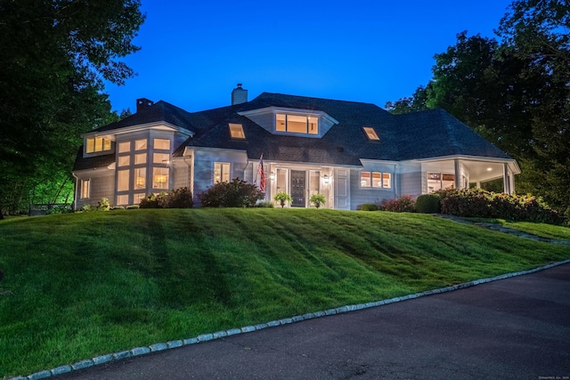 63 Balfour Dr, West Hartford, CT 06117 - view of front facade with a chimney and a front lawn