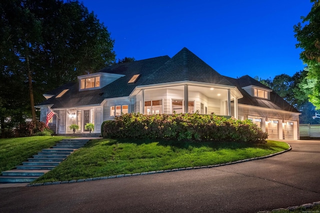 63 Balfour Dr, West Hartford, CT 06117 - view of front of house with a lawn, driveway, and a garage