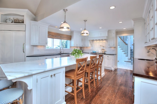 63 Balfour Dr, West Hartford, CT 06117 - kitchen featuring a sink, white cabinetry, dark wood-style floors, recessed lighting, and crown molding