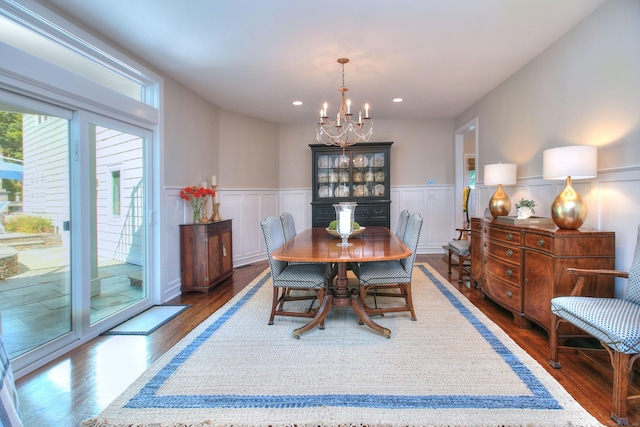 63 Balfour Dr, West Hartford, CT 06117 - dining area featuring a chandelier, wood finished floors, wainscoting, recessed lighting, and a decorative wall