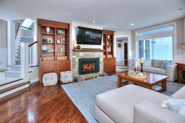 63 Balfour Dr, West Hartford, CT 06117 - living area featuring stairway, dark wood finished floors, a fireplace, and recessed lighting