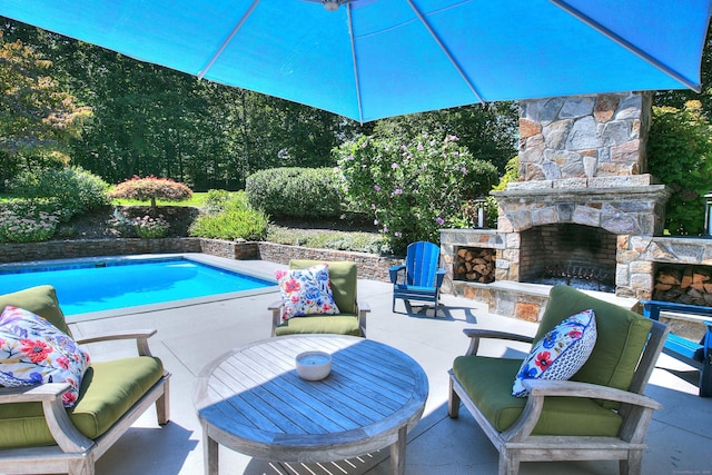 63 Balfour Dr, West Hartford, CT 06117 - swimming pool with a patio area and an outdoor stone fireplace