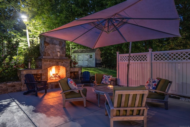 63 Balfour Dr, West Hartford, CT 06117 - view of patio / terrace with an outdoor stone fireplace