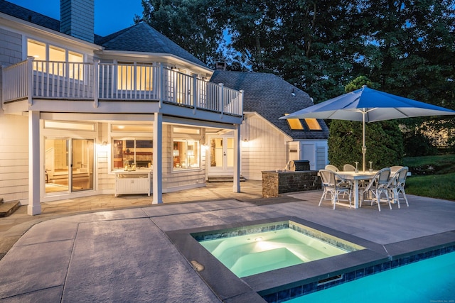 63 Balfour Dr, West Hartford, CT 06117 - back of house with a balcony, a patio, a chimney, outdoor dining space, and an outdoor pool