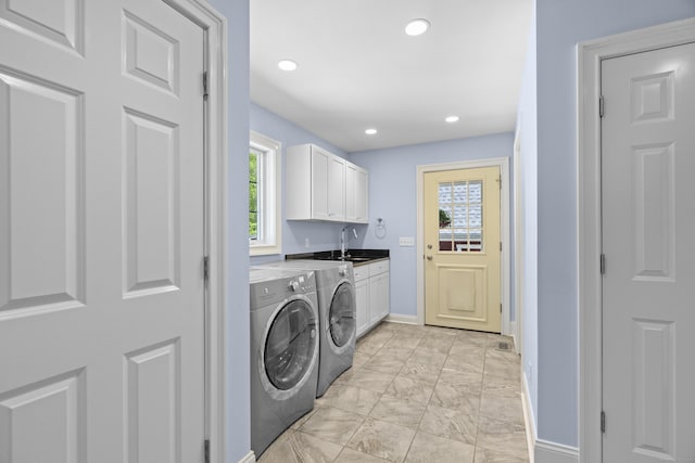 140 Podunk Rd, Guilford, CT 06437 - washroom featuring cabinet space, washer and dryer, baseboards, light marble finish floors, and recessed lighting