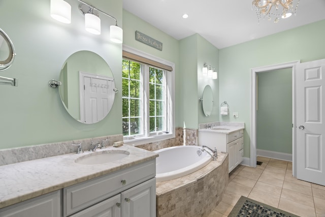 140 Podunk Rd, Guilford, CT 06437 - full bath featuring two vanities, a bath, a chandelier, and tile patterned floors
