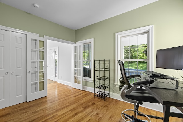 140 Podunk Rd, Guilford, CT 06437 - office featuring french doors, wood finished floors, and baseboards