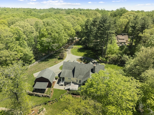 140 Podunk Rd, Guilford, CT 06437 - view from above of property with a heavily wooded area