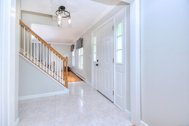 23 Davis Rd, Seymour, CT 06483 - entryway featuring stairs, crown molding, light tile patterned flooring, and a baseboard heating unit