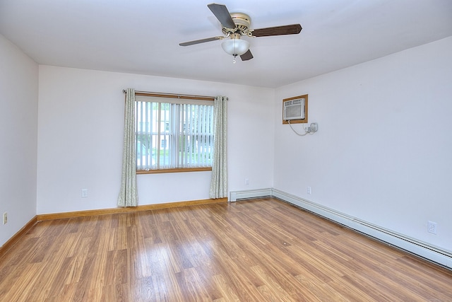 23 Davis Rd, Seymour, CT 06483 - spare room featuring light wood-style flooring, ceiling fan, a wall mounted AC, and a baseboard radiator